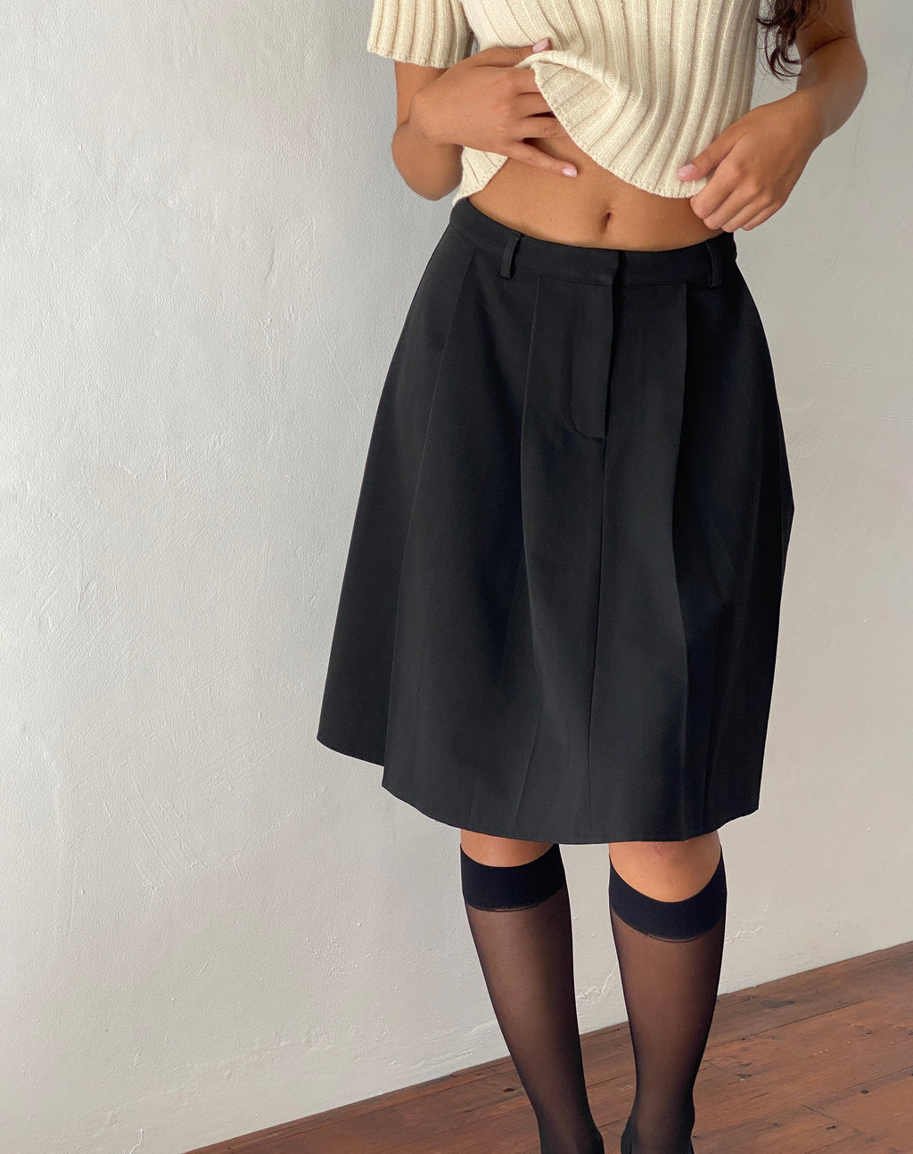 Colette Pleated Knee Length Skirt in Black Tailoring