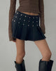 Image of Gatlin Pleated Denim Mini Skirt in Black Wash with Studs