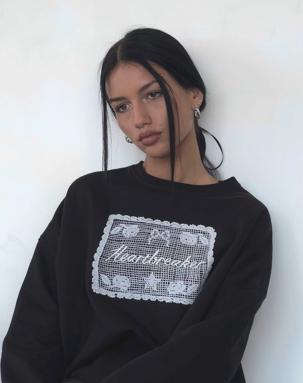 Glo Oversized Sweatshirt in Black with Heartbreaker Graphic