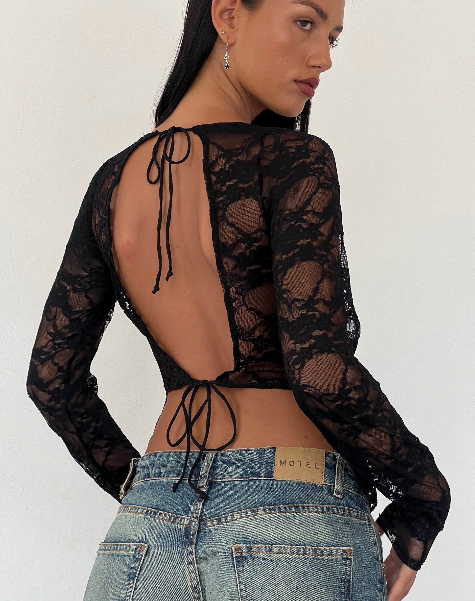 Image of Grizelda Backless Long Sleeve Top in Black Abstract Lace