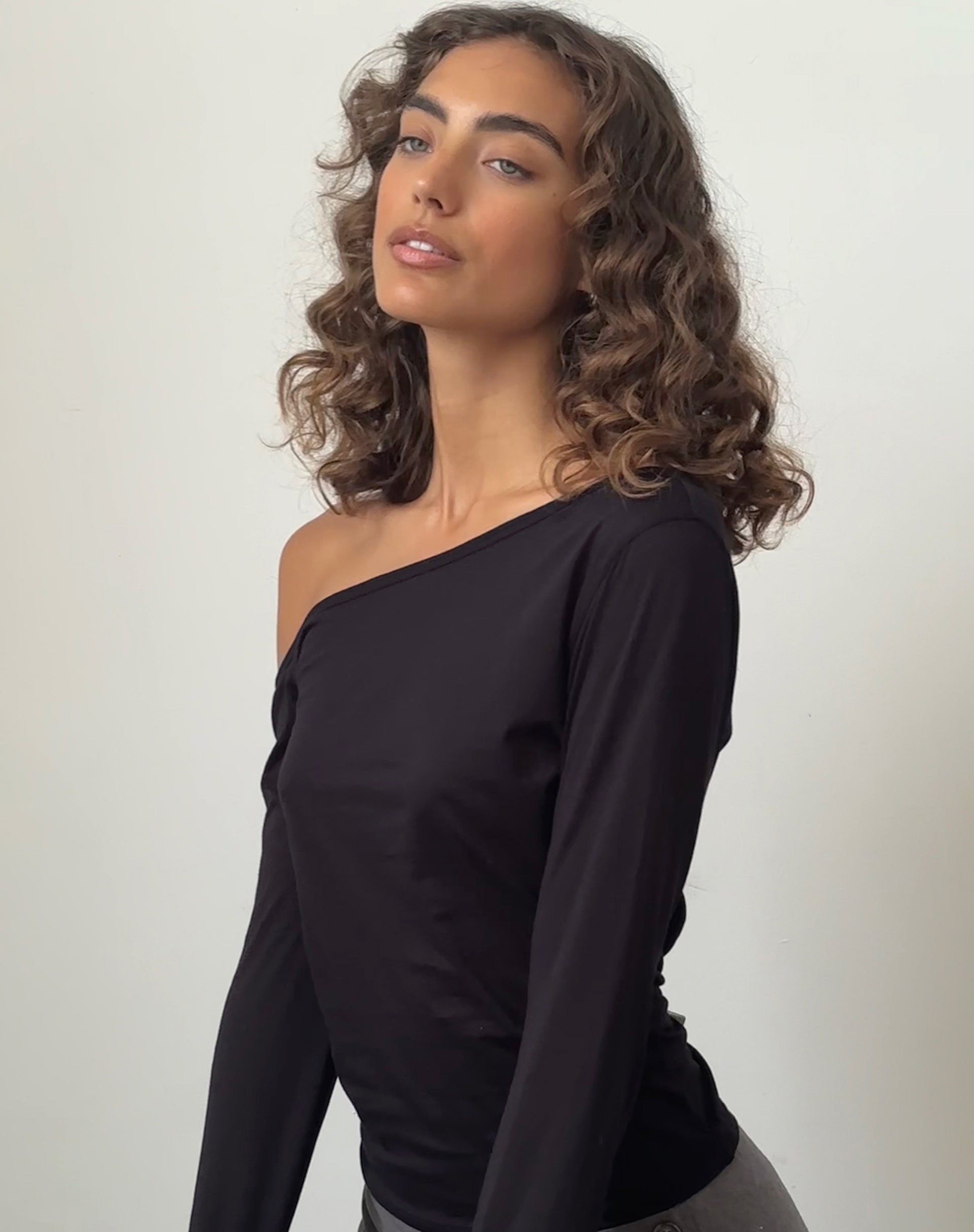 Image of Ledez Asymmetrical Slouchy Top in Black Tissue Jersey