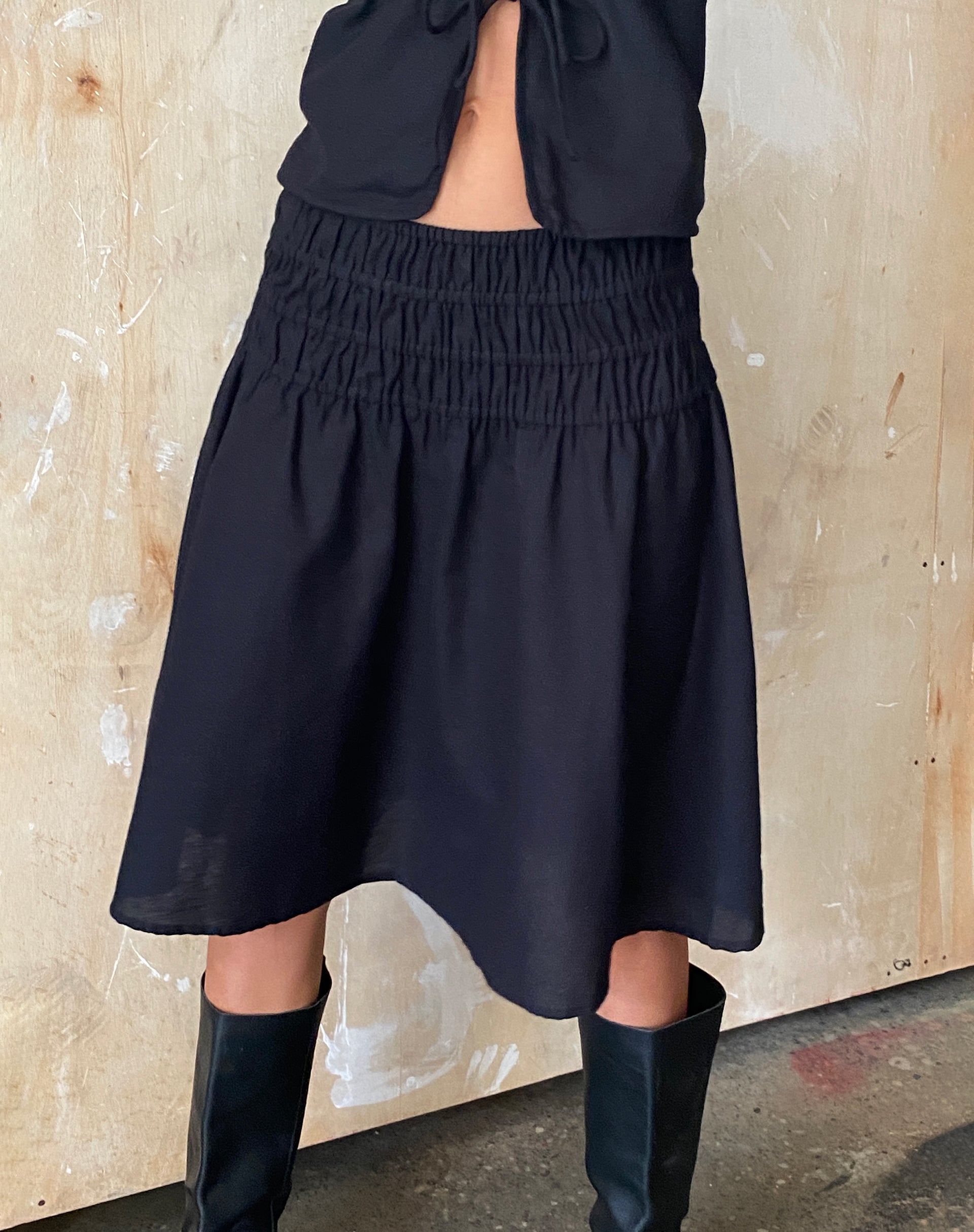 image of MOTEL X JACQUIE Neleta Shirred Waist Midi Skirt in Black