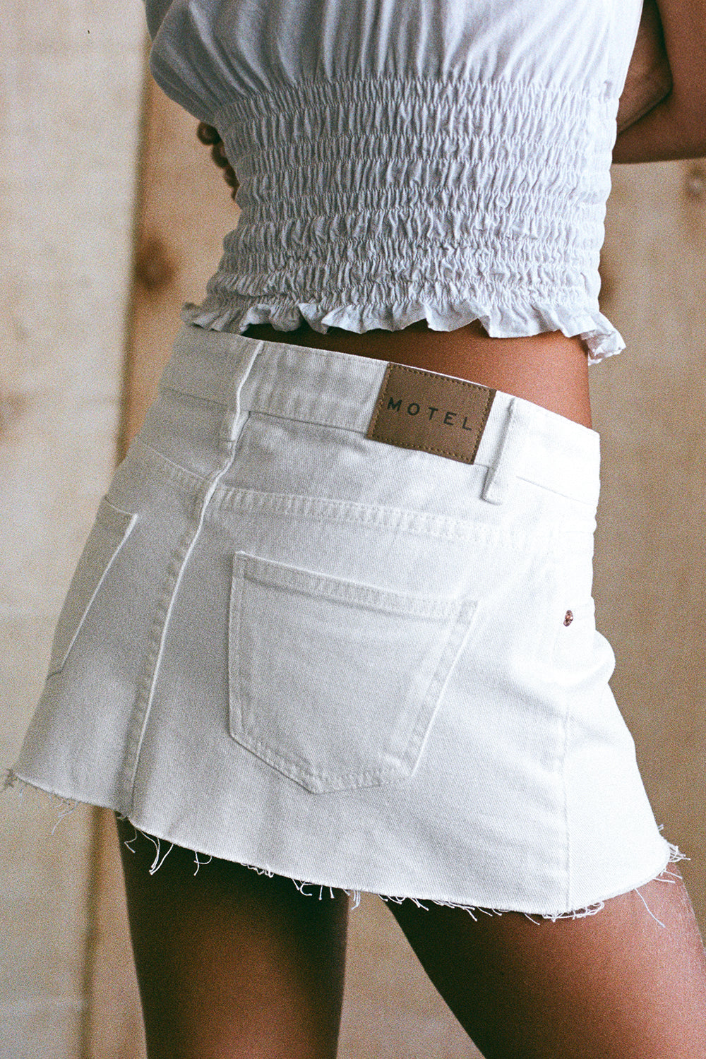 Raw Hem Denim Mini Skirt in True White