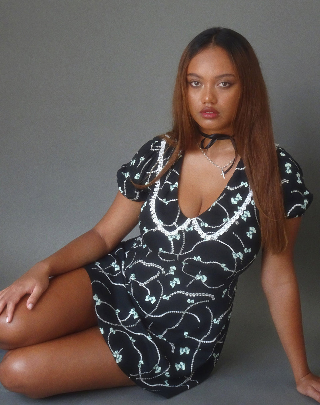 Sulani Mini Dress in Black with Pearl and Bow Print