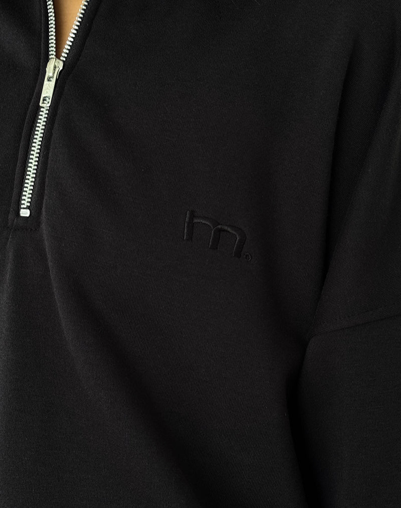 Image of Tirma High Neck Jumper in Tonal Black with M Embroidery