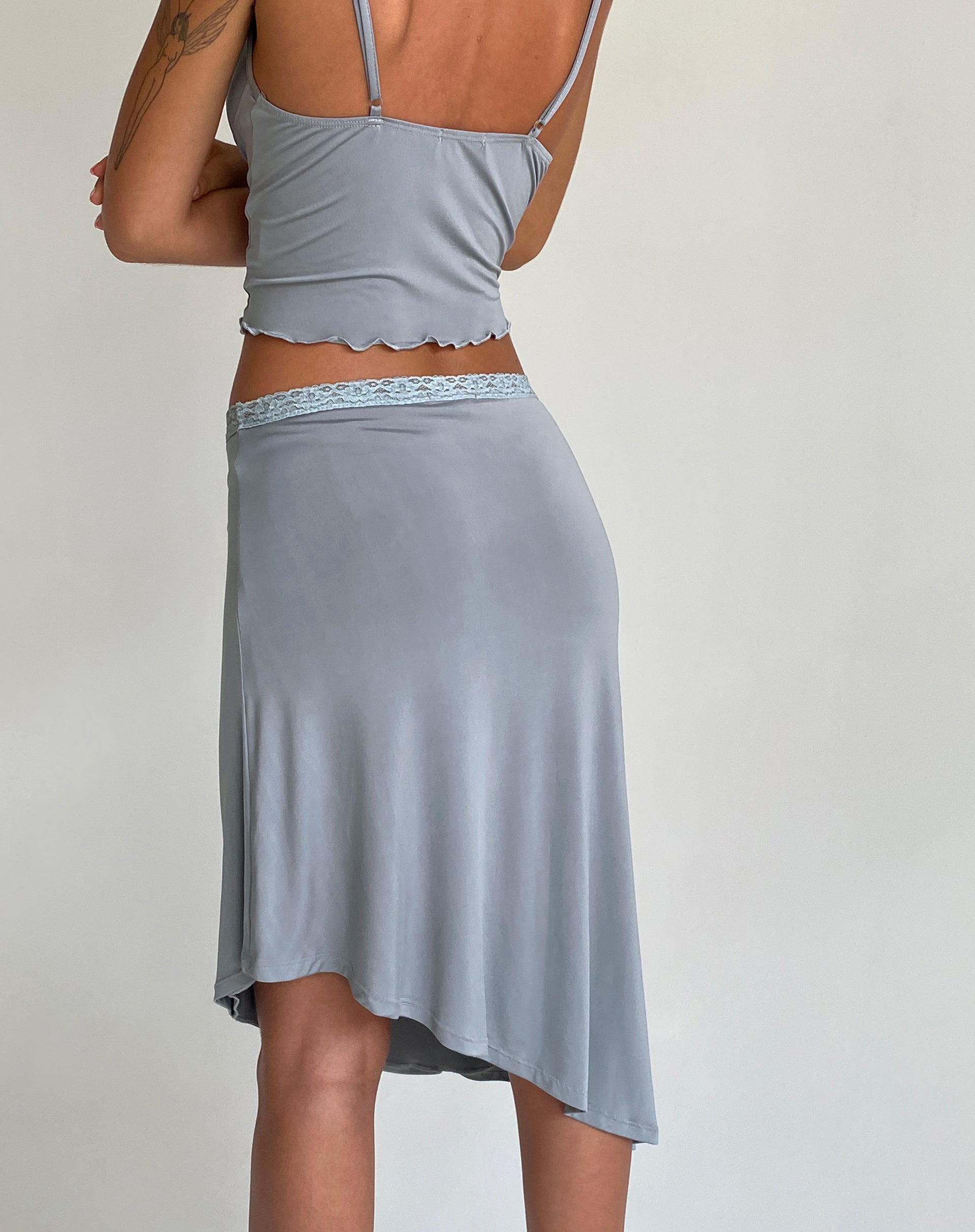 Asymmetrical skirt clearance with logo taping