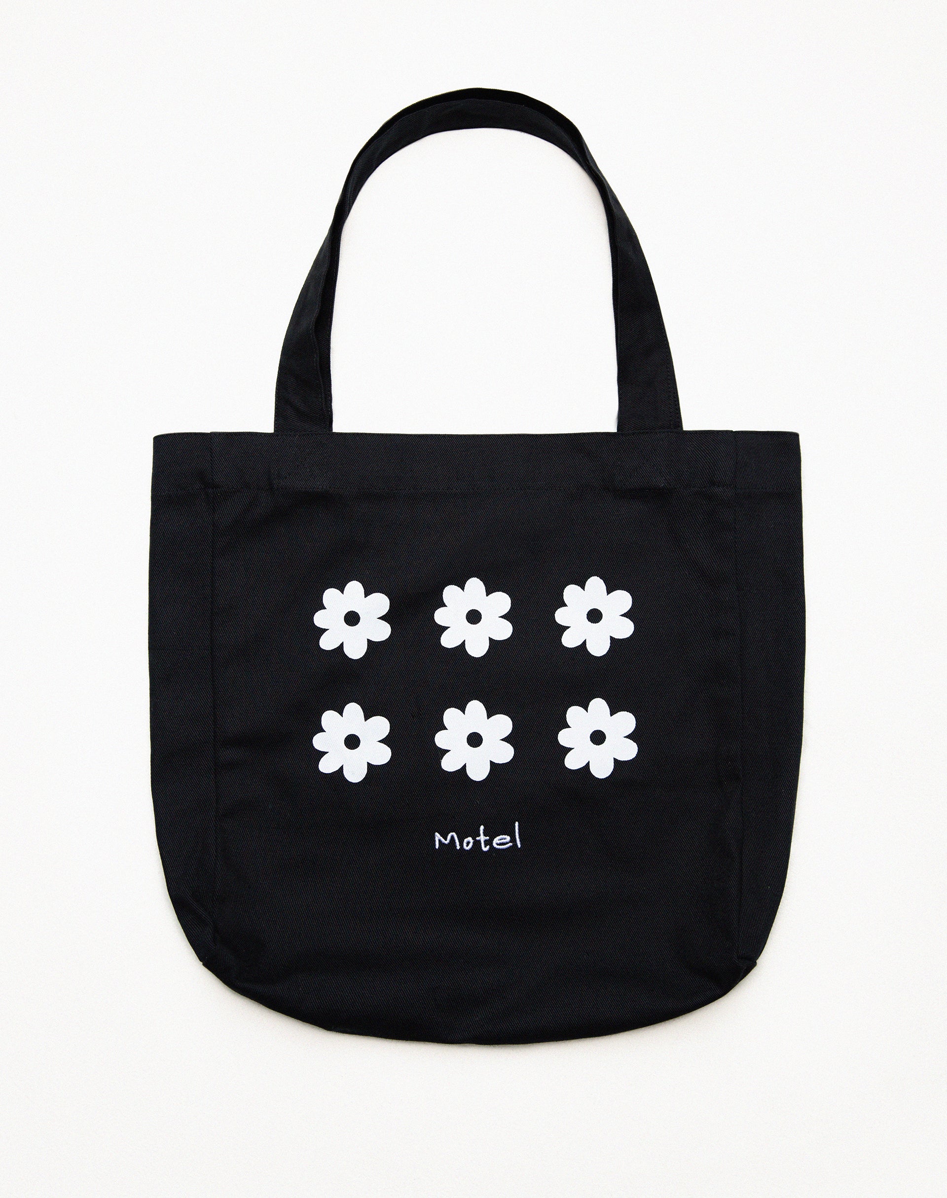 White bag with online black flowers