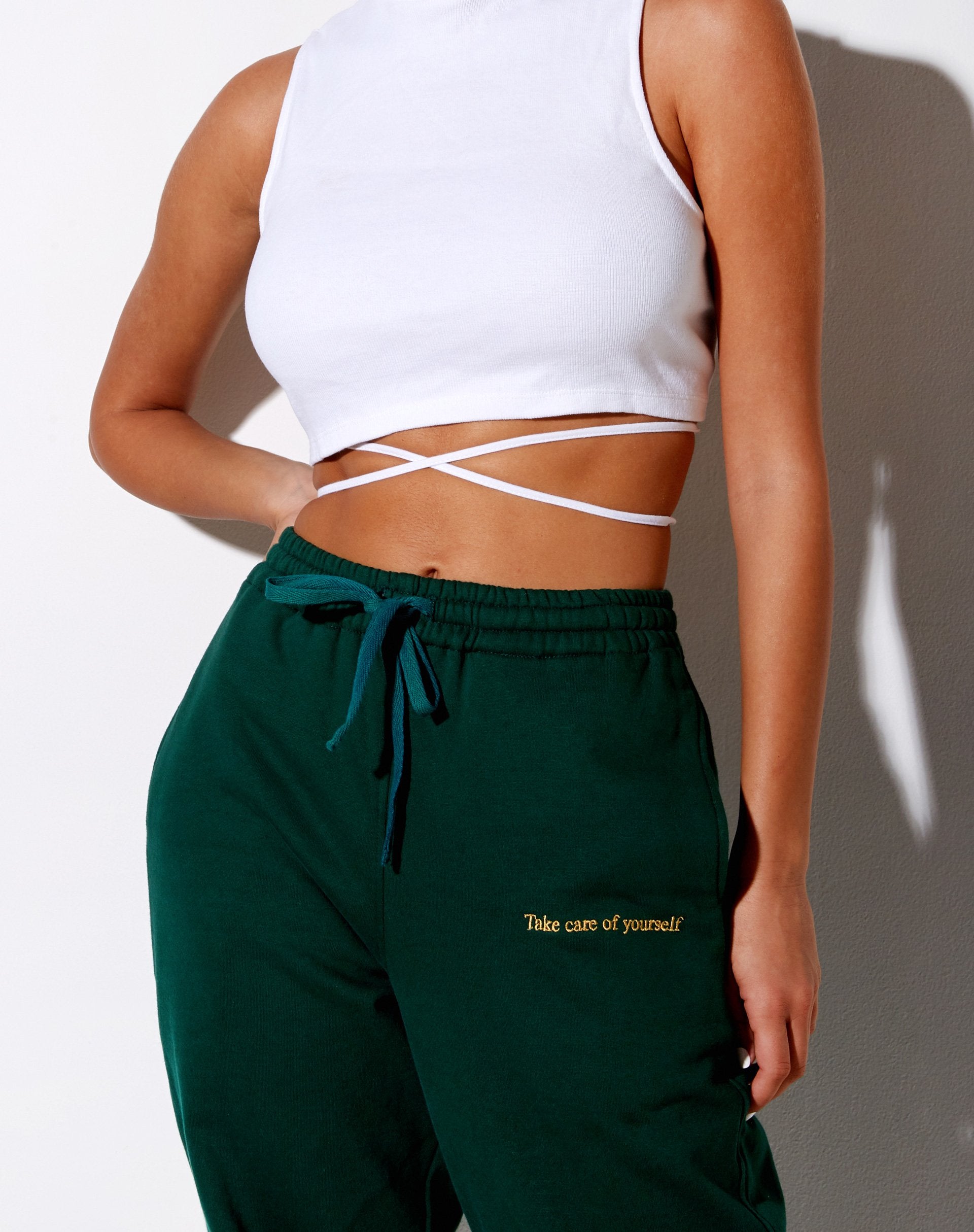 Image of Basta Jogger in Bottle Green with Take Care Of Yourself Embro