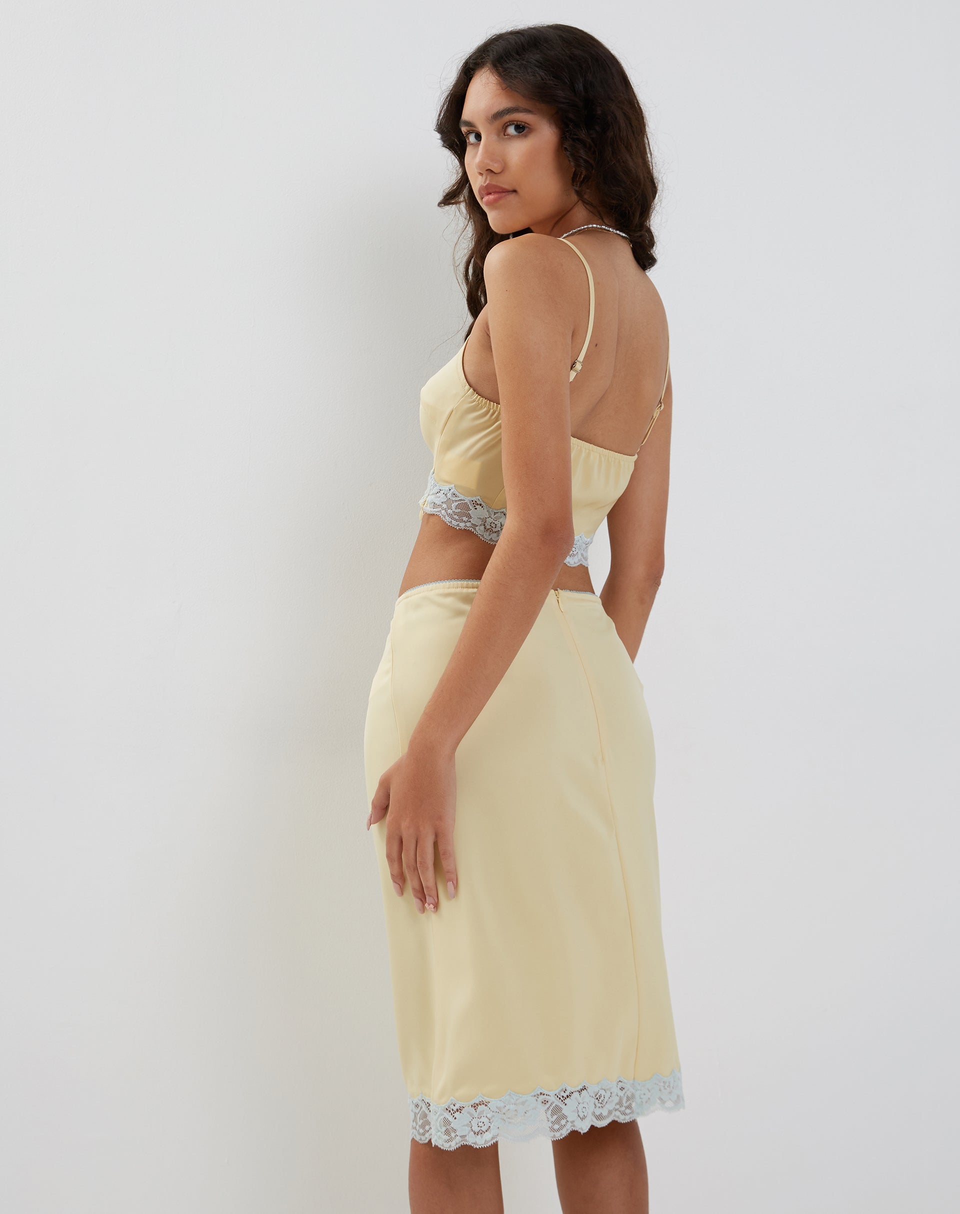 Image of Resika Low Rise Midi Skirt in Satin Pale Yellow